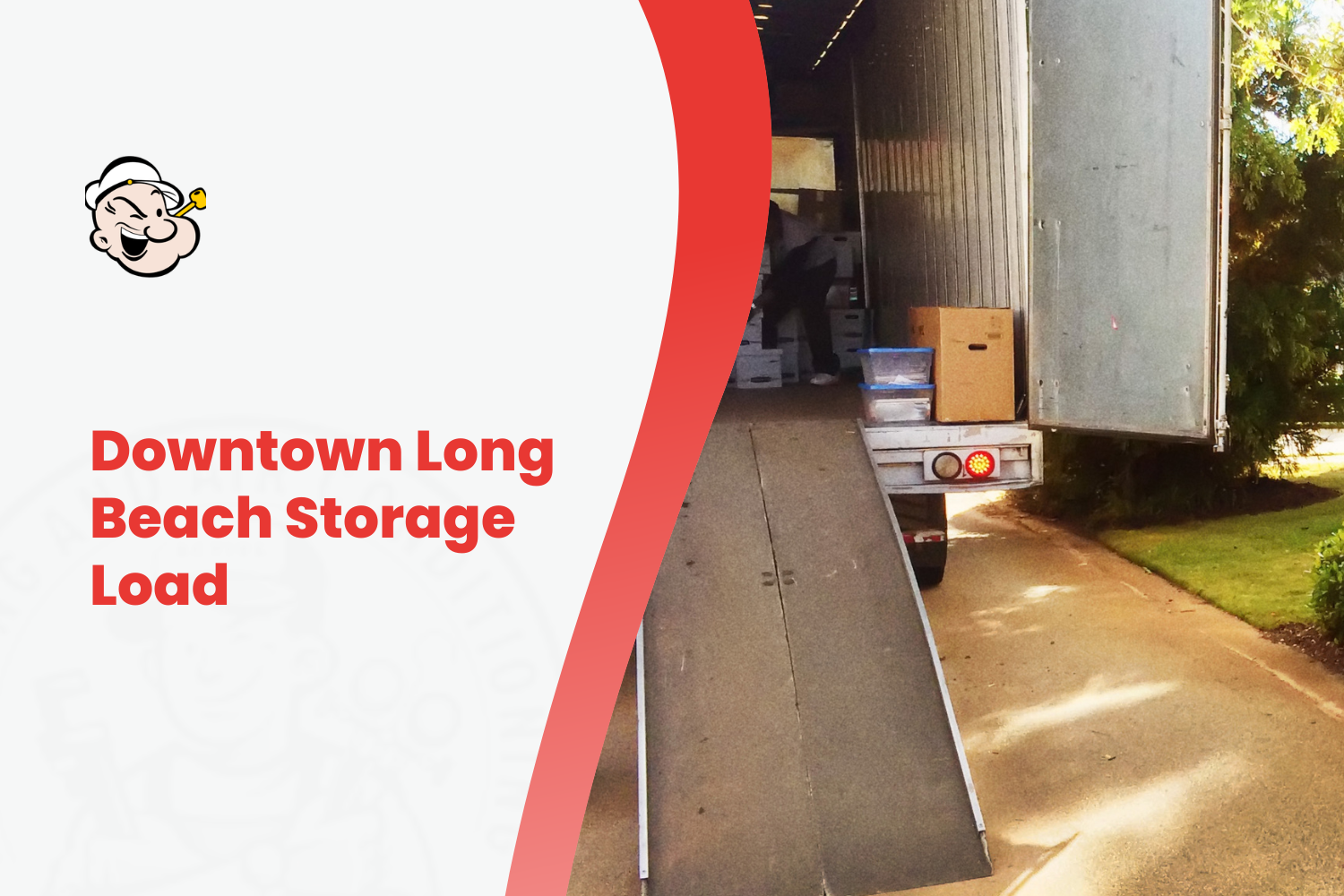 Moving truck loaded with boxes and storage items on residential driveway ramp