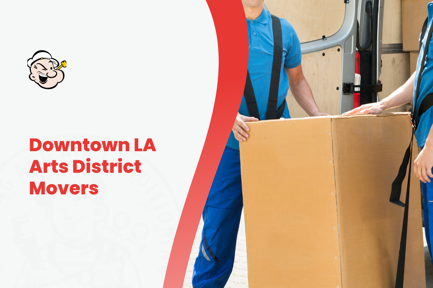 Two movers in blue uniforms loading large cardboard box into moving van