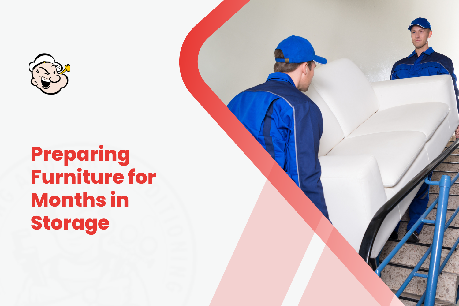 Two movers in blue uniforms carrying white sofa upstairs for long-term storage