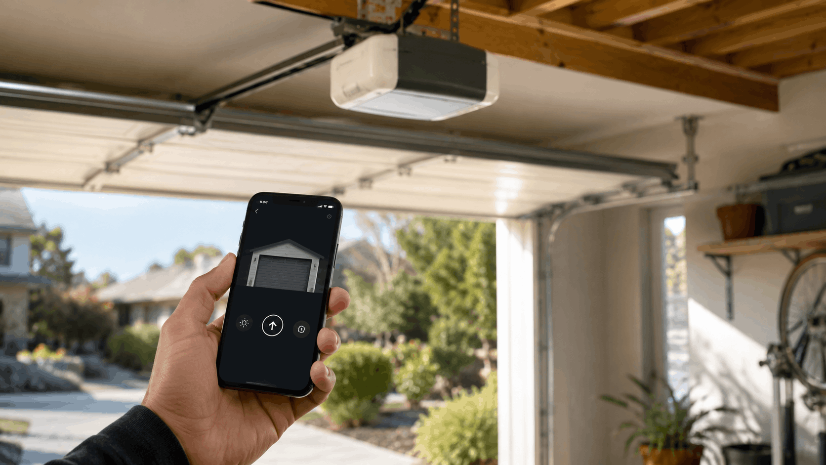 Person using smartphone app to control cellular garage door opener in Irvine home