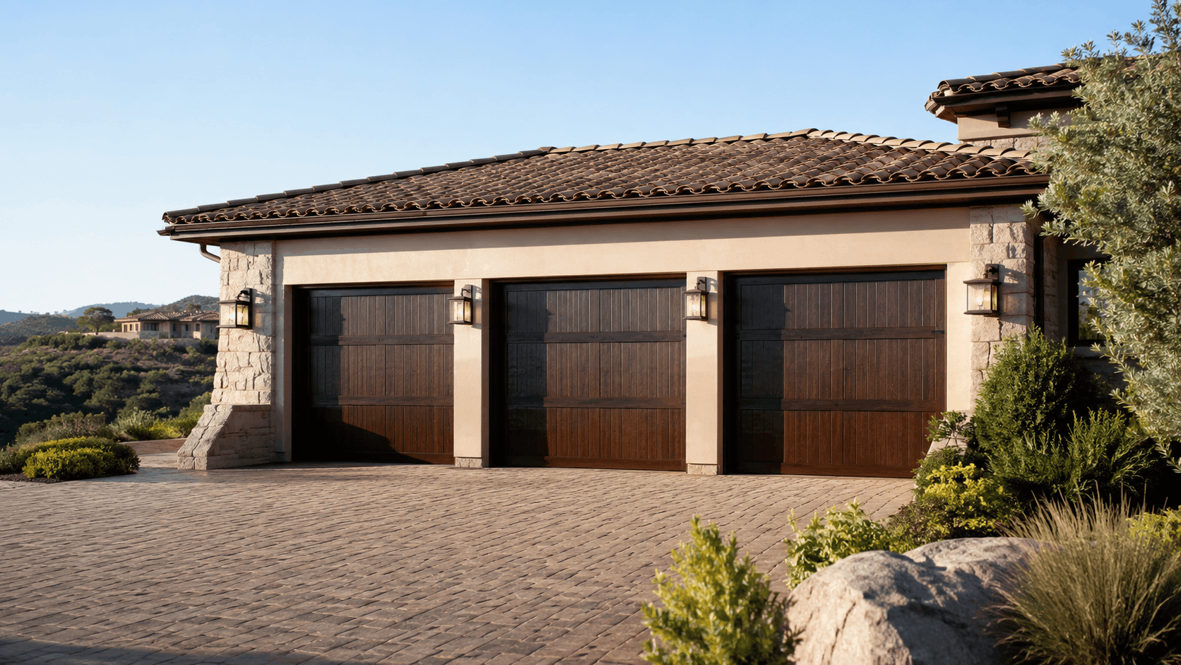 Three-car garage with dark wood doors on luxury Shady Canyon Irvine estate