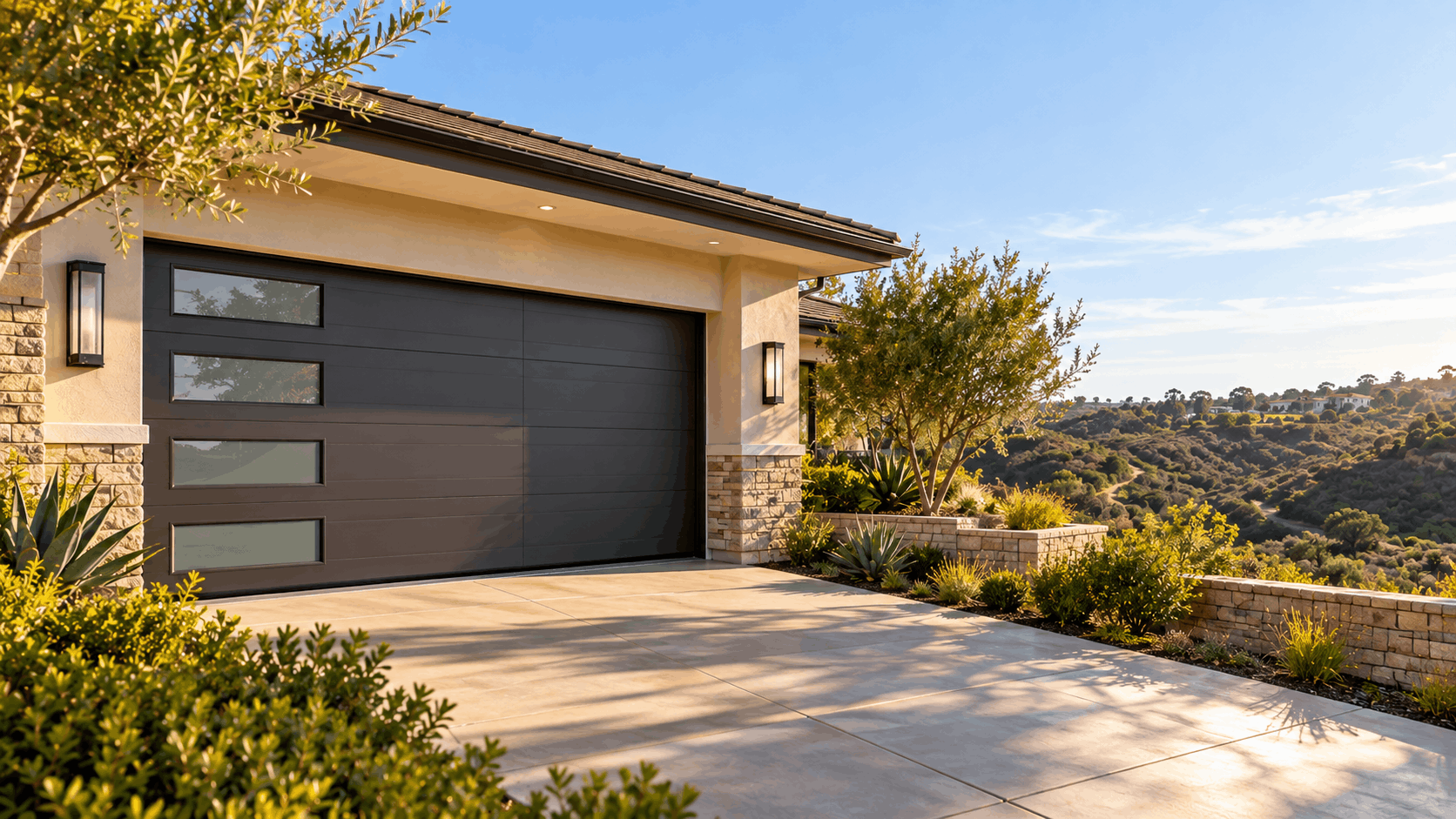 Modern dark garage door with glass panels on hillside home in Irvine California