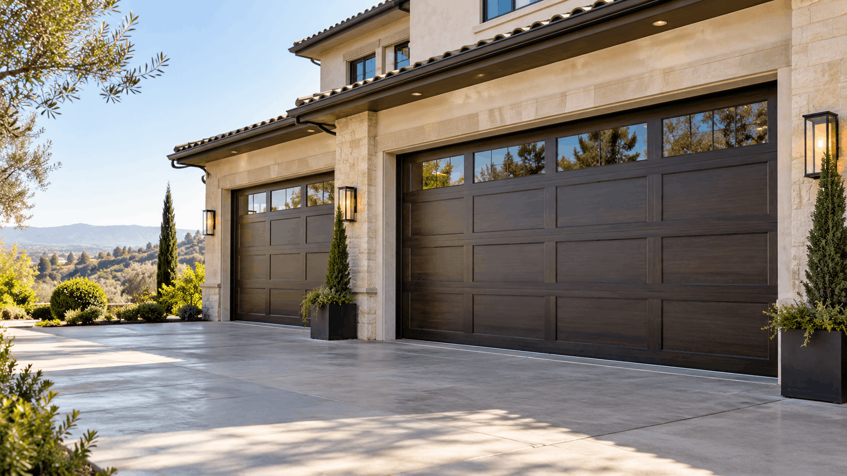 Luxury Irvine home with dark brown wood-panel garage doors and stone facade