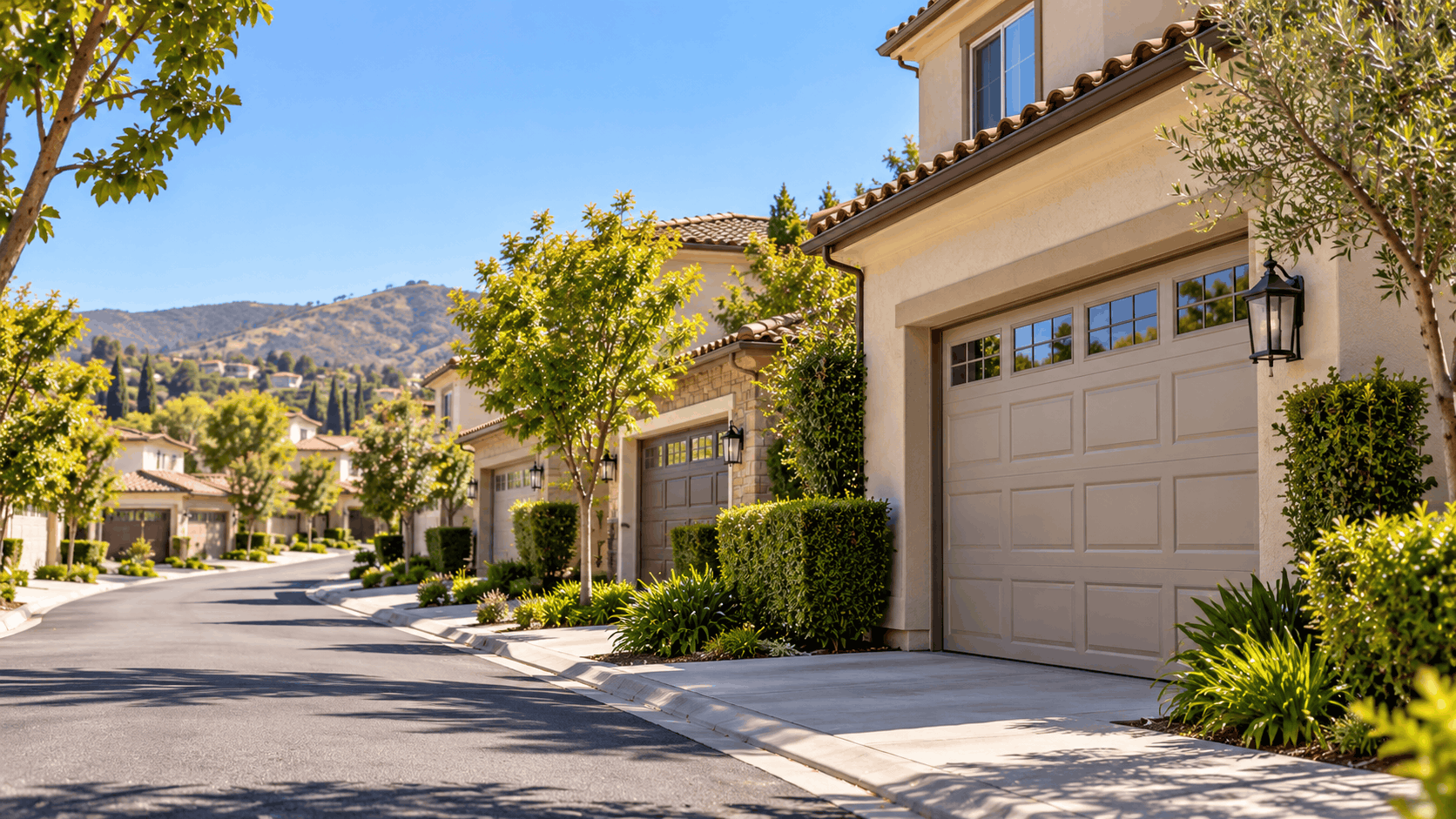 Northwood Irvine residential street with beige stucco homes featuring tan garage doors
